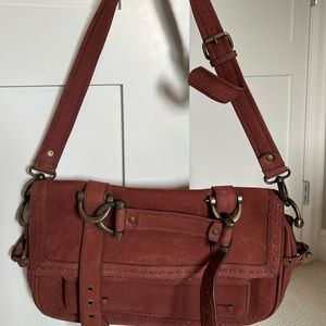 John fluevog Leather Rust coloured hand bag with adjustable shoulder strap